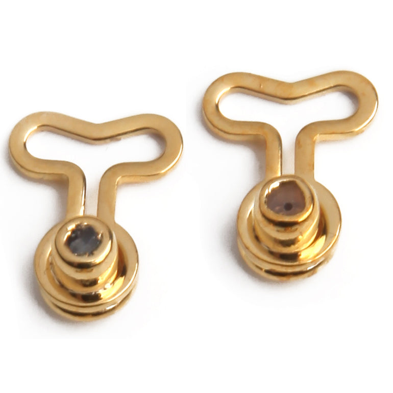 One pair of goldtone T-back T-shaped earring backs on a white background