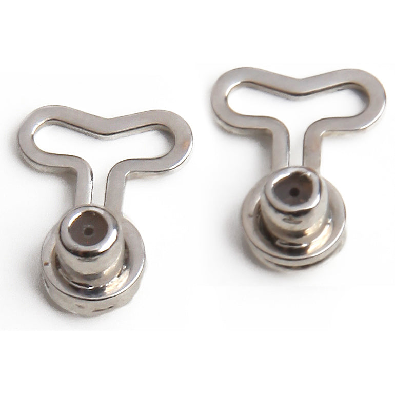 silvertone T-backs T-shaped earring backs laid on a white background.
