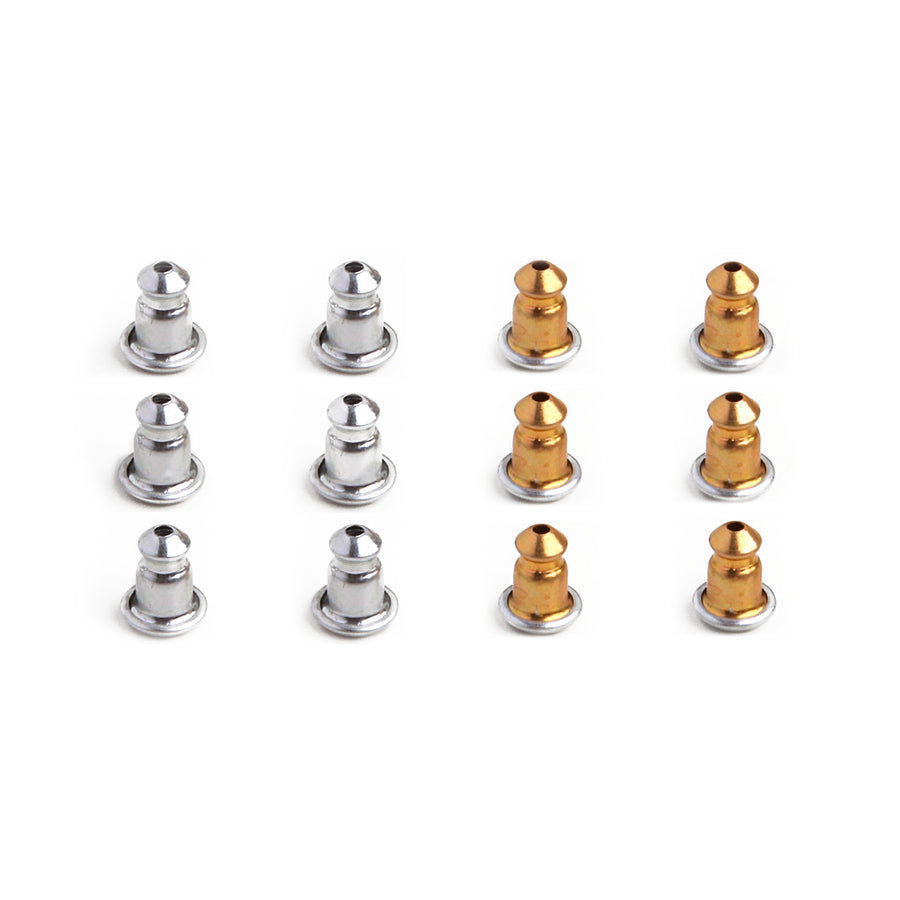 twelve gold and silver aluminum earring backs laid out in a rectangle on a white background.
