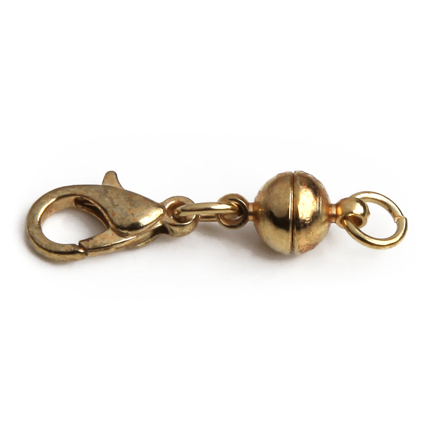 one goldtone small sphere magnetic clasp.