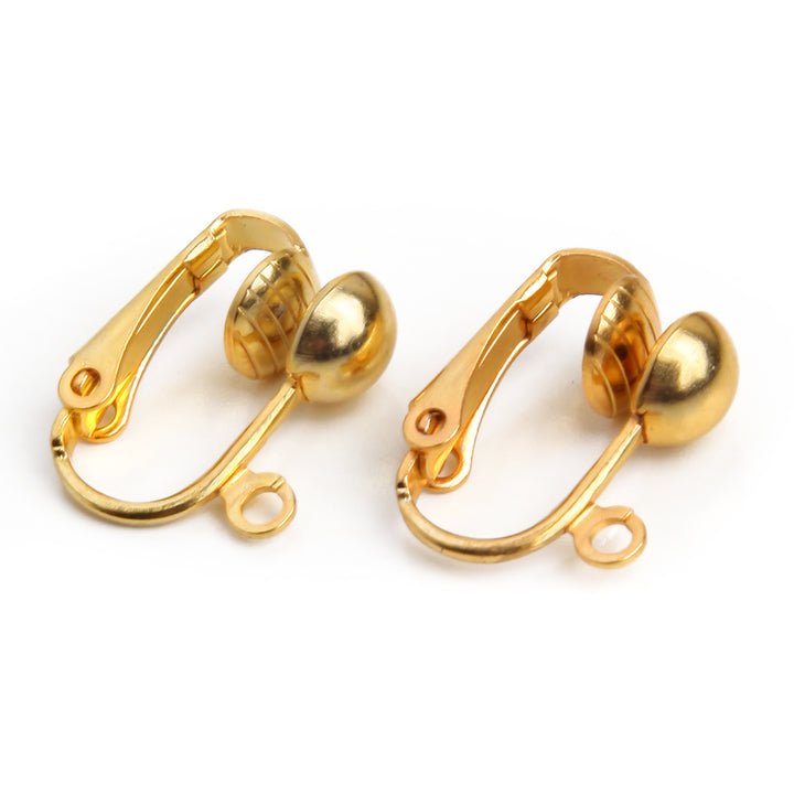 two fish hook to clip on earring converters on a white background