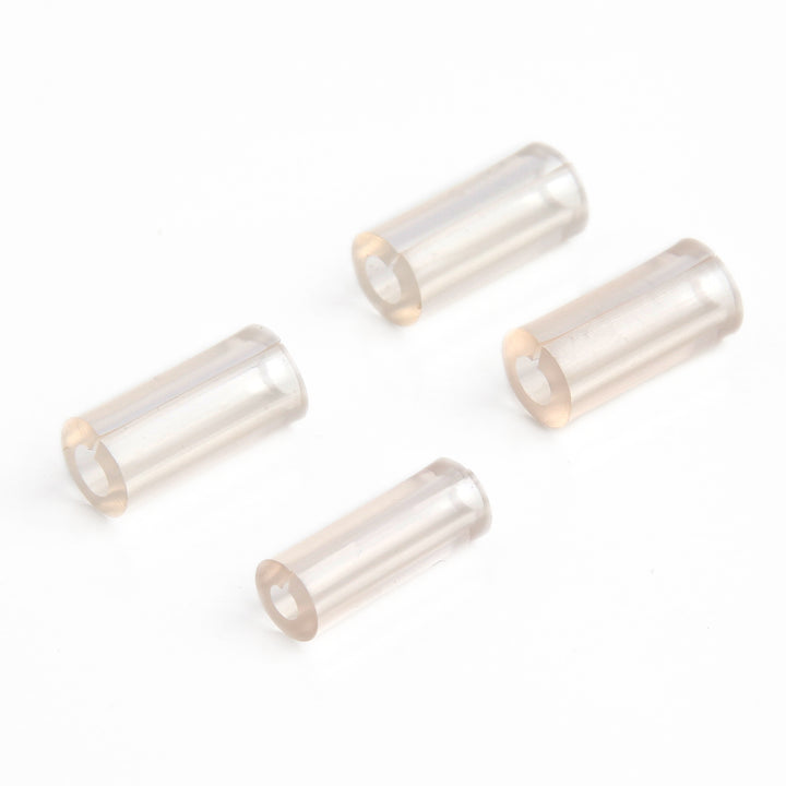 four clear plastic tubes that are ring sizers in a white background.