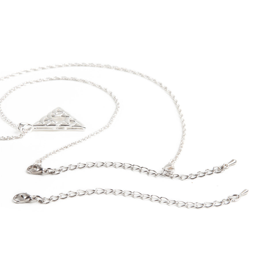 One silver necklace extender in front of a silver triangle necklace with attached silver necklace extender.