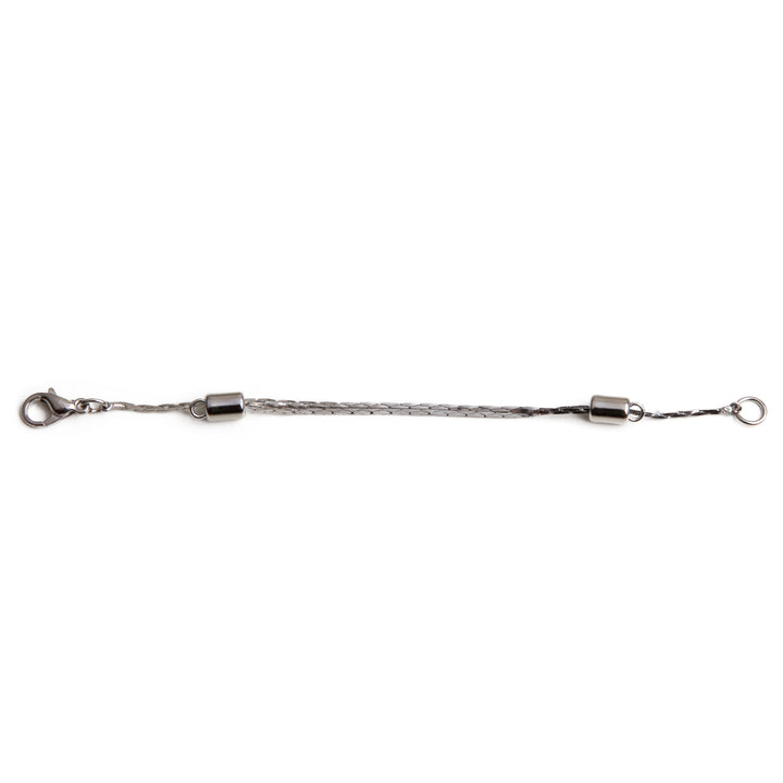 one silver adjustable necklace extender laid out on a white background.