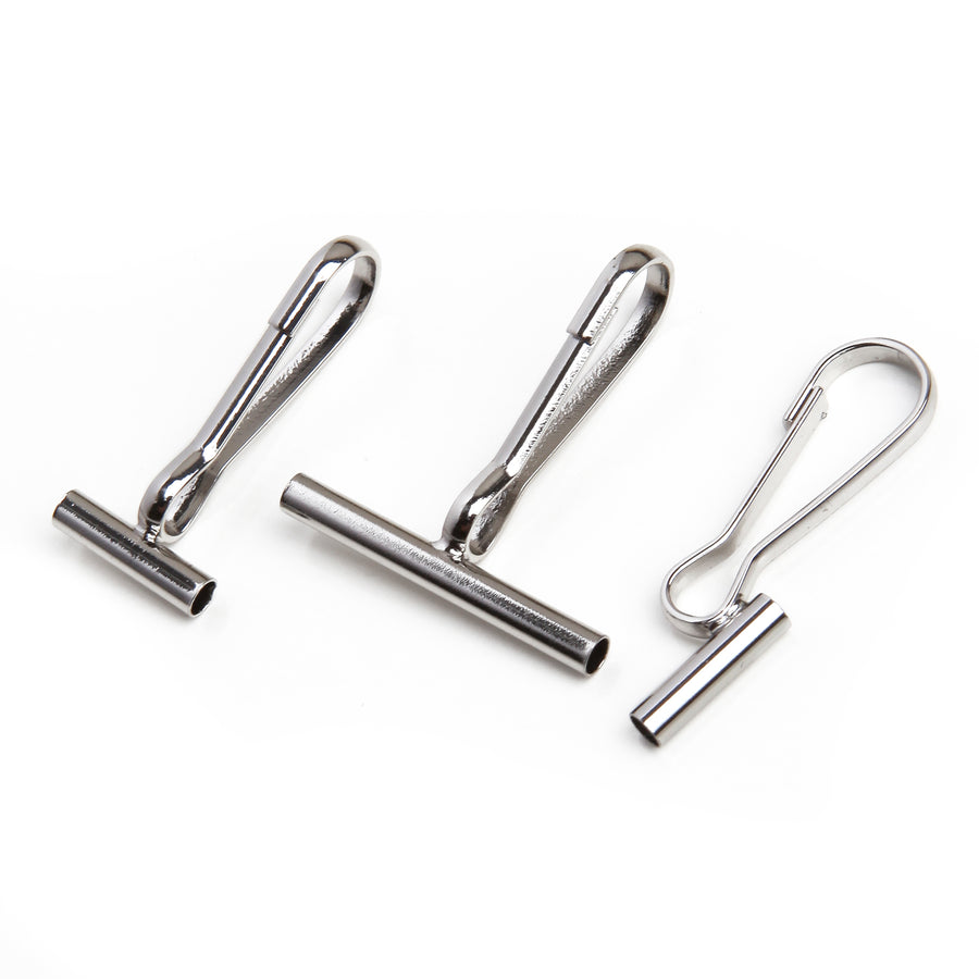 One small horizontal pin converter, one large horizontal pin converter, and one vertical pin converter all in silver on a white background.