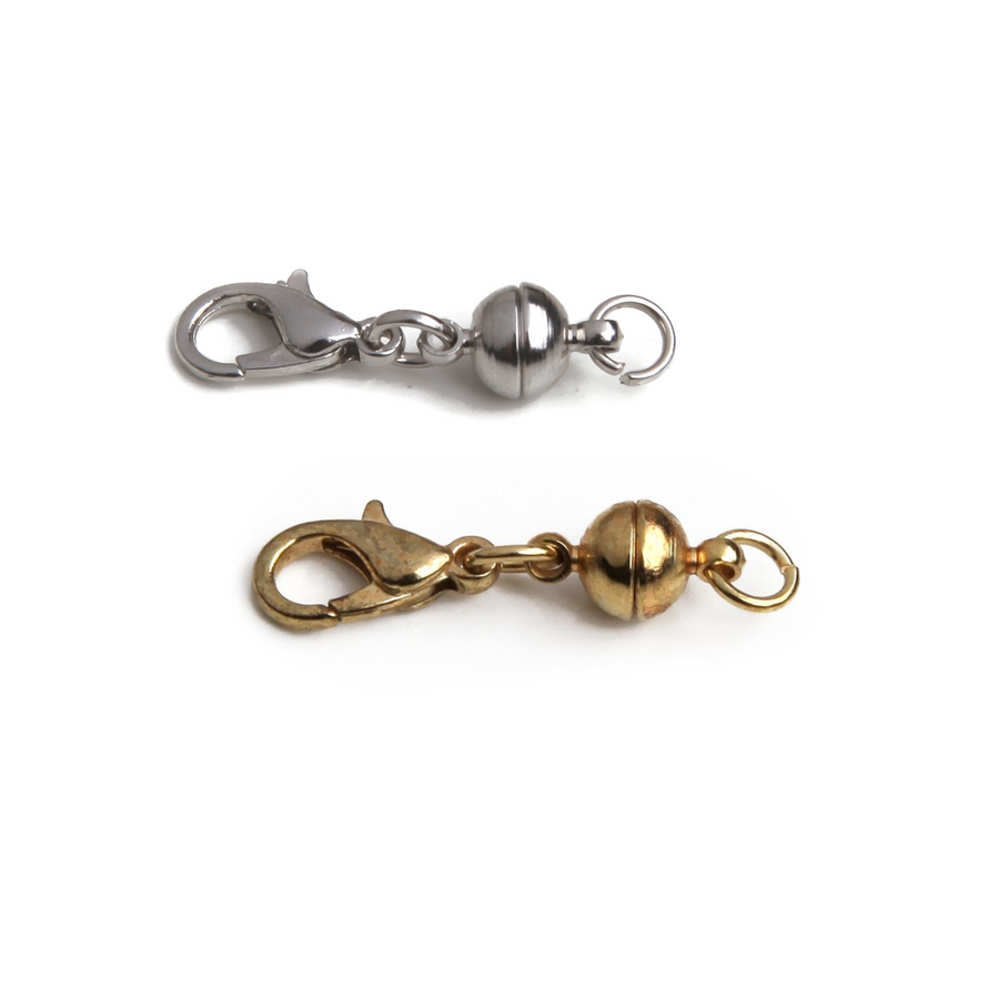two small sphere magnetic clasps in silver and gold.