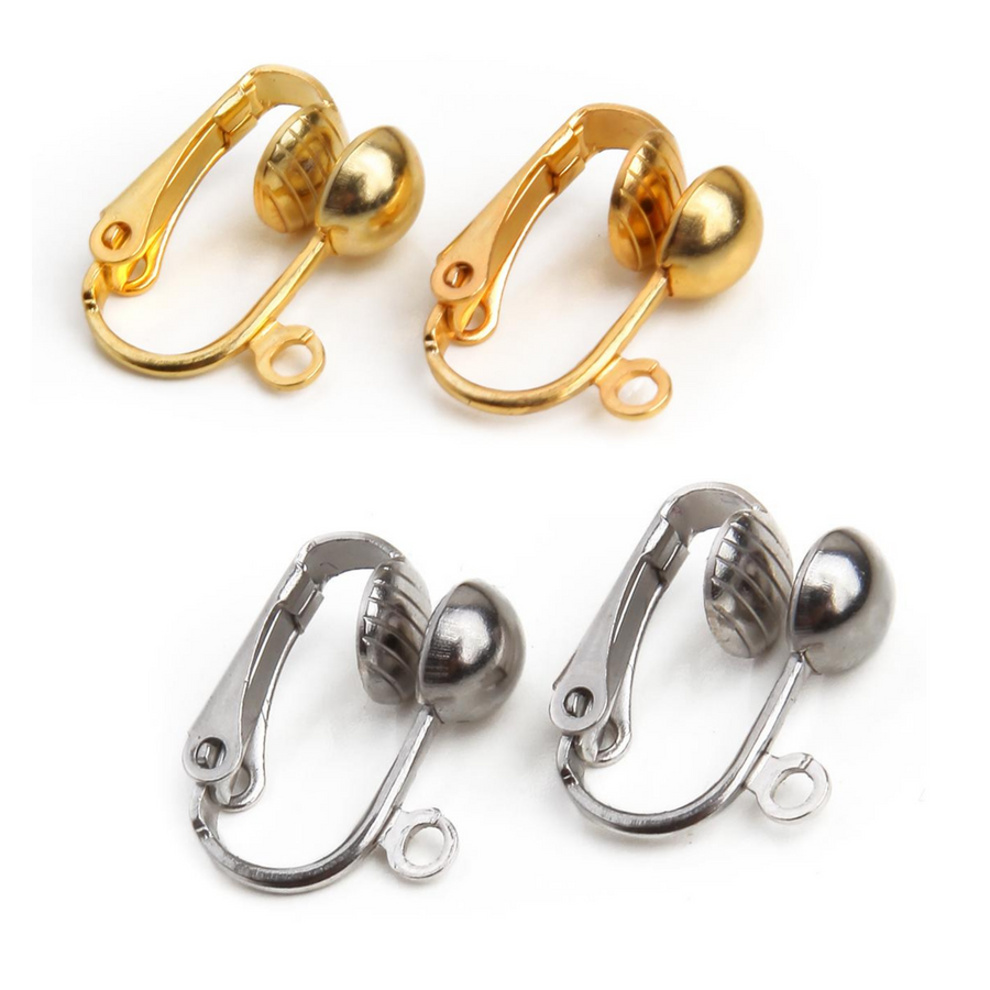 four fish hook to clip on earring converters with two in goldtone and two in silvertone on a white background
