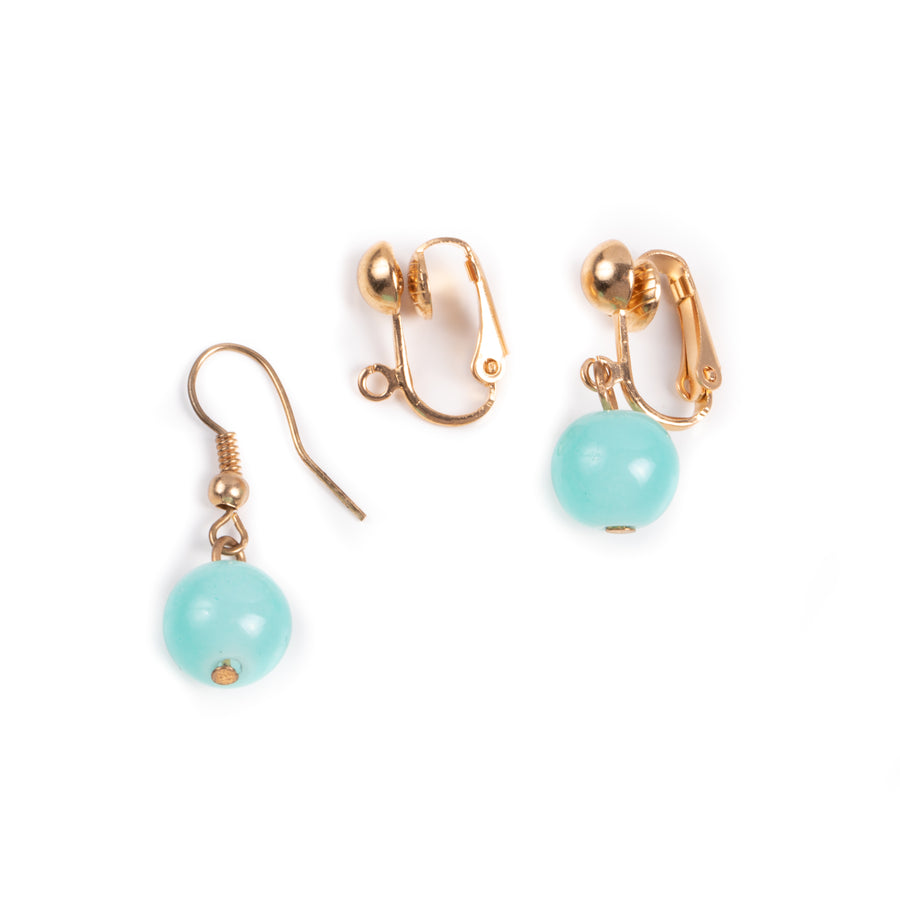 two fish hook to clip on earring converters in goldtone showing before and after using converters with turquoise dangle earrings on a white background