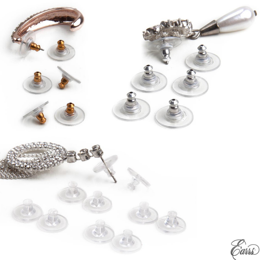 Clear, goldtone, and silvertone disc earring backs laid out next to three different earrings of silver and gold to show how the three different colors look on stud earrings.