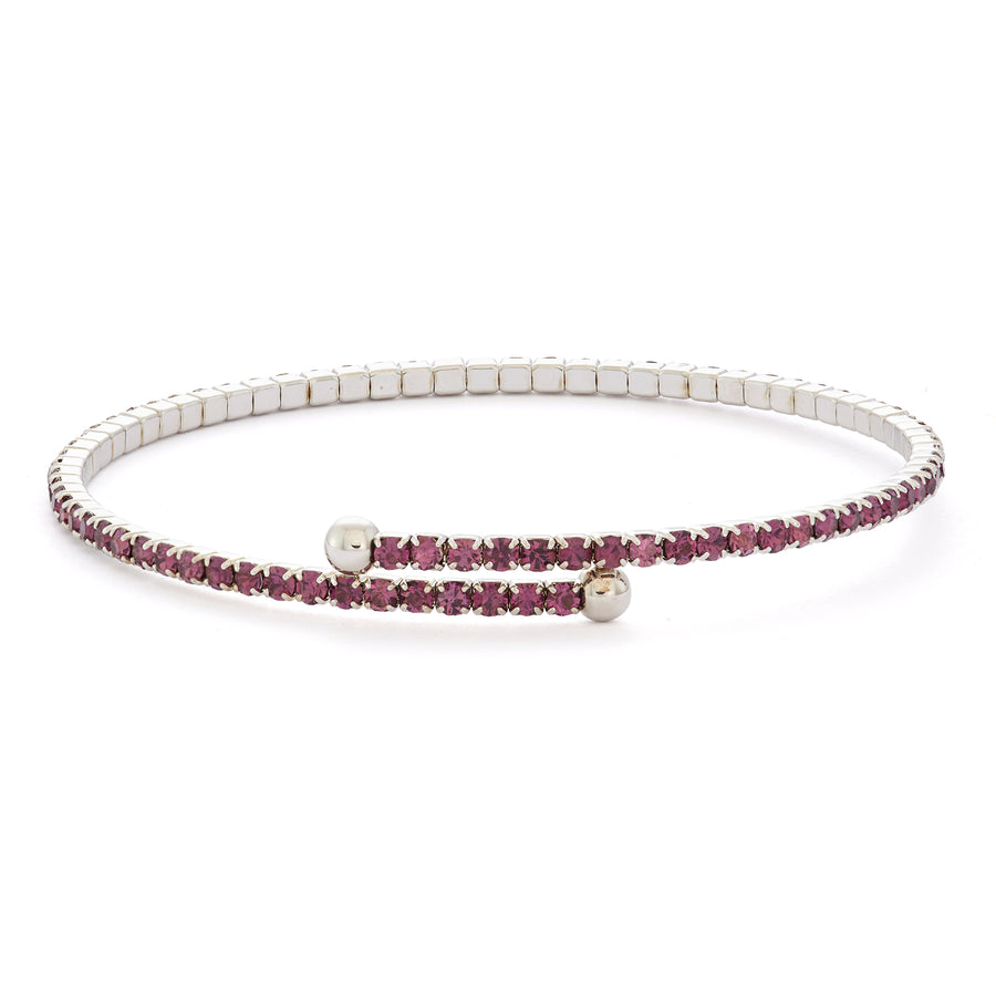 a flexible bangle bracelets with amethyst austrian crystal gemstones in a silver rhodium setting against a white background