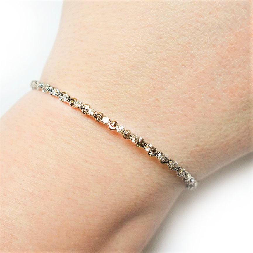 Silver Bangle Bracelet with Clear Austrian Crystals and Textured Beads