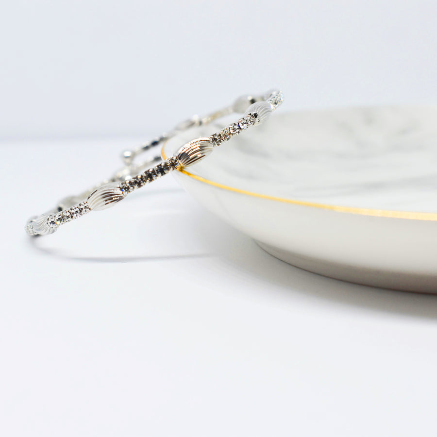 Silver Bangle Bracelet with Clear Austrian Crystals and Oblong Lined Beads