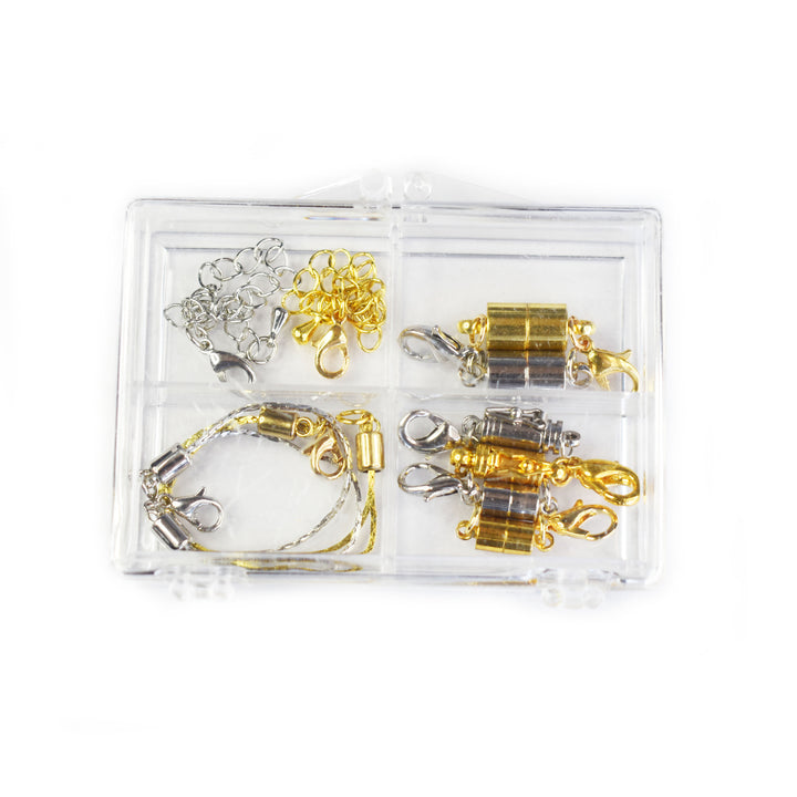 Gold and Silver magnetic necklace clasps with silver and gold necklace extenders in a four-compartment clear box.