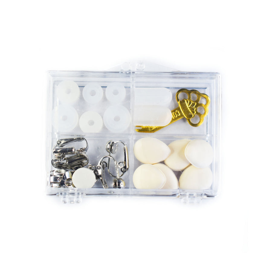 Three types of clip earring converters, three types of clip earring cushions, and a tension key in a compartmental plastic box.