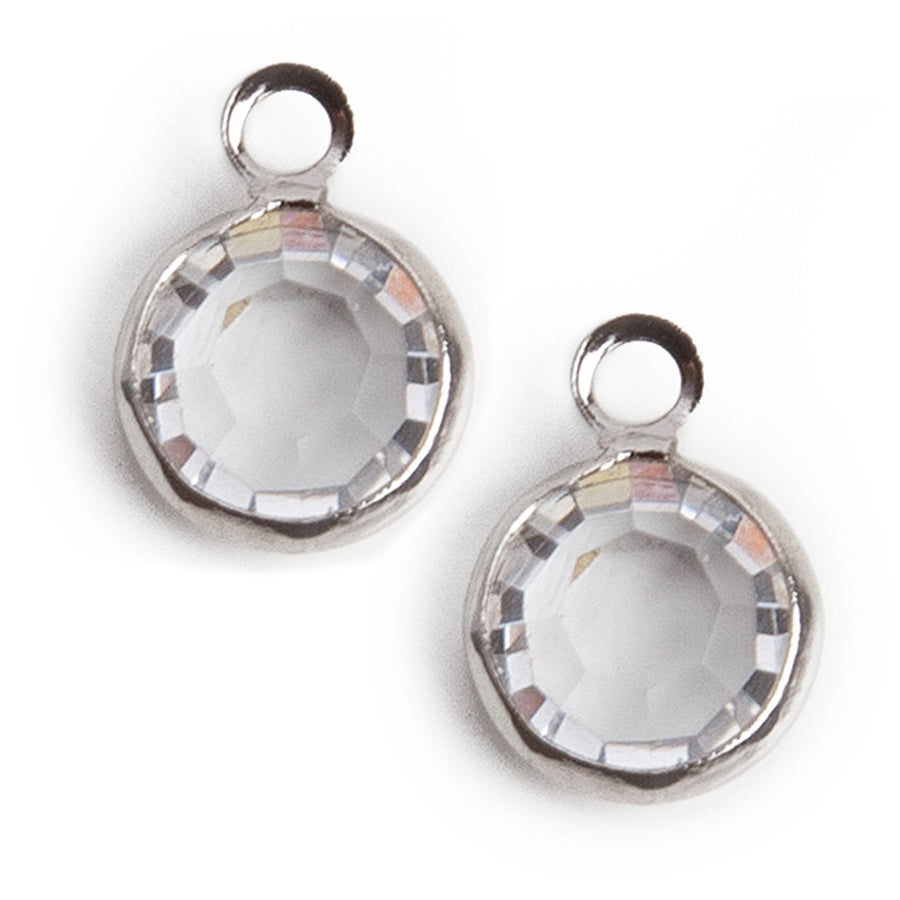clear iridescent crystal charm in a stainless steel setting with loop on top 