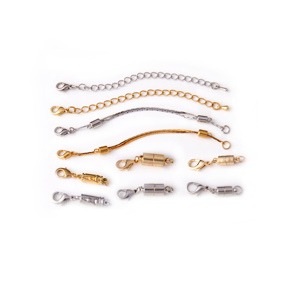 Four gold and silver necklace extenders and 6 gold and silver magnetic necklace clasps laid out in a square